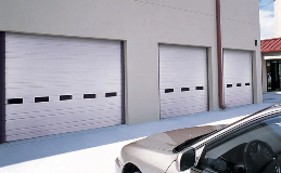 Industrial Series | Deep Ribbed Steel commercial garage door Model 520 in White